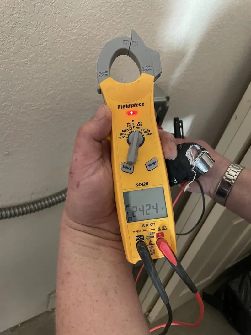 Voltage testing with clamp meter during Electrical Installation Services in Park Forest